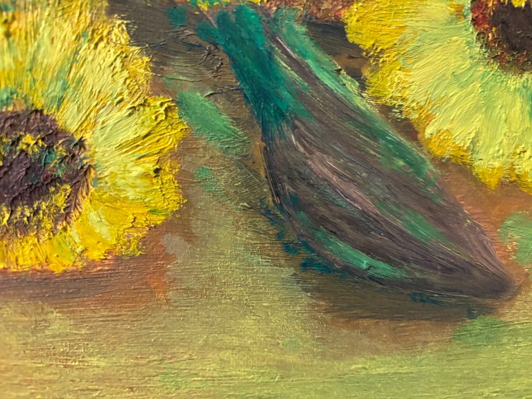 ひまわりと麦わら帽子