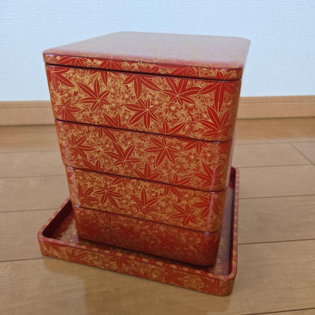 【未使用】輪島塗 四段重 雲錦彫り 詰め網代 沈金 台付き 二枚蓋