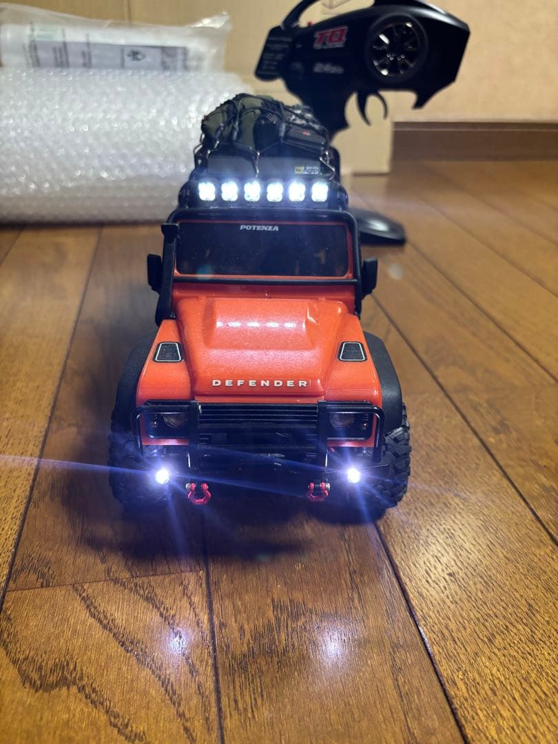 トラクサス4M、社外品リヤトレーラー付き