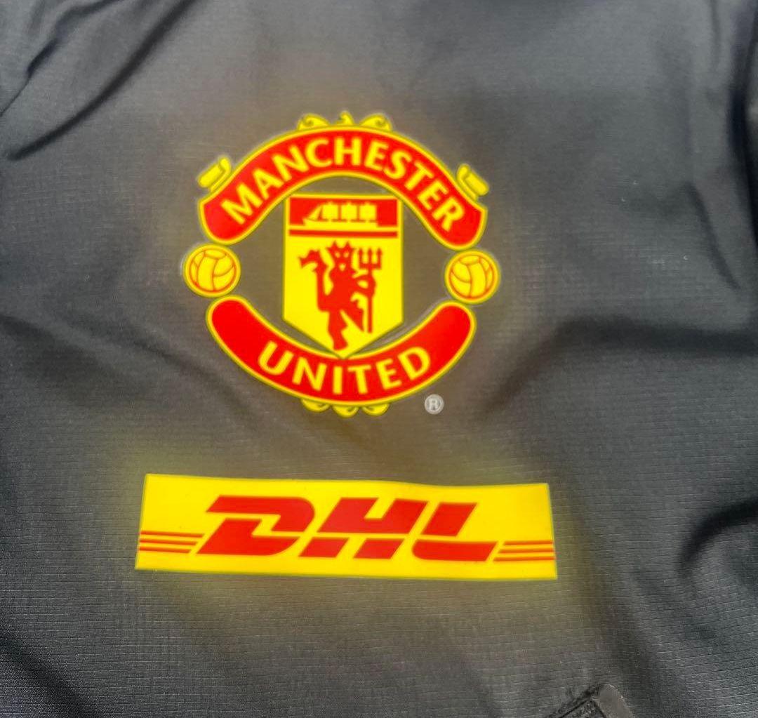 Nike マンチェスター・ユナイテッド ベンチコート