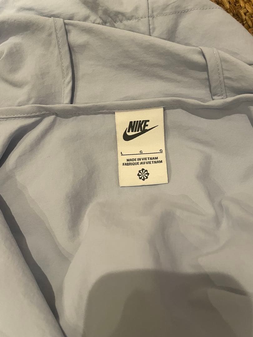 Nike レディース レインウェア L ライトブルー