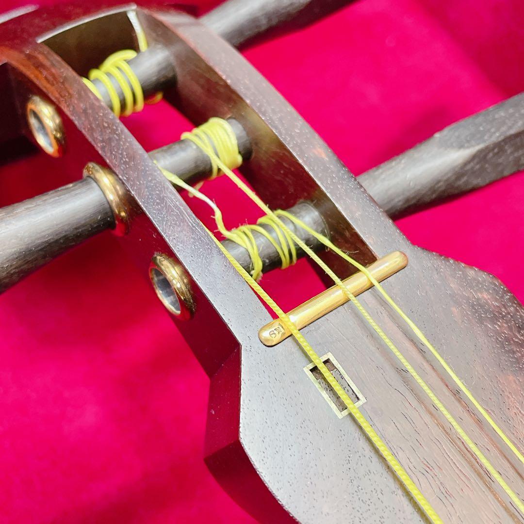 三味線 中棹 トチ紅木 子持ち綾杉胴 K9 一本溝 角胸