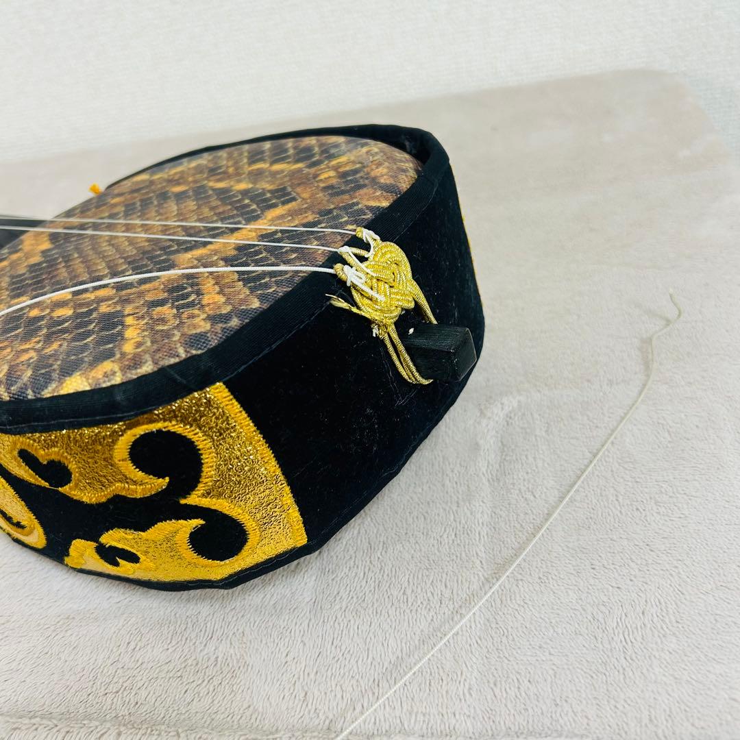 沖縄三線 三味線 人工革 合皮 ヘビ柄　ハードケース付 またよし　弦楽器