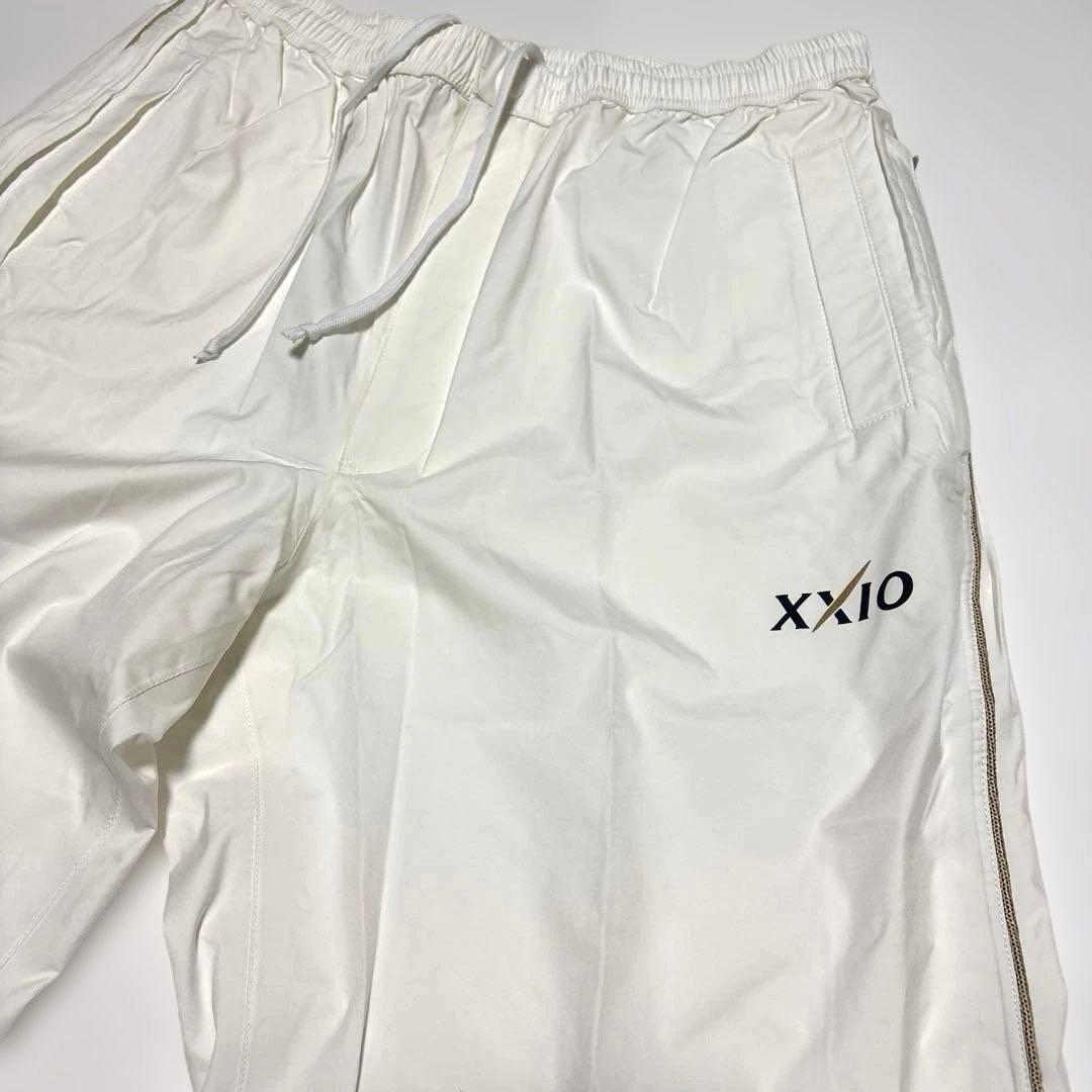 タグ付き未使用　xxio ゴルフ用レインウェア ホワイト ロゴ入　サイズXL