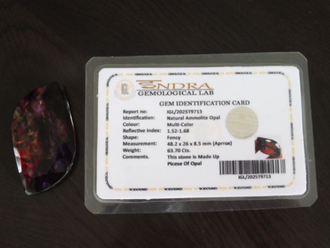 焔虹の奇跡 アンモライト　63.70ct 鑑定書付き