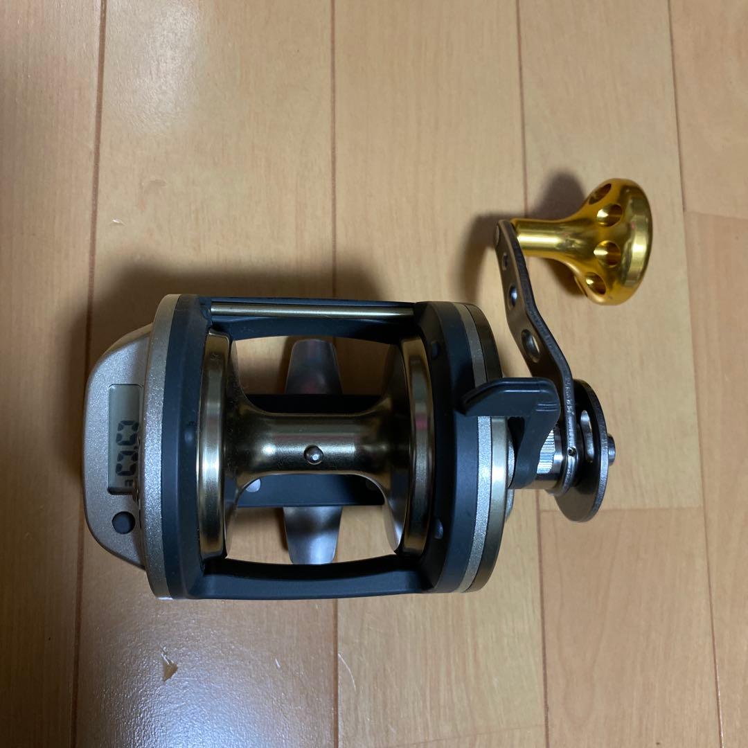 ダイワ石鯛リールと釣武者チタンパワーディスクドラックハンドル付き