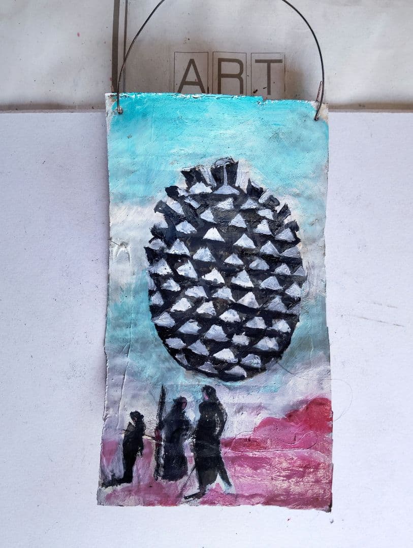 松ぼっくりと人