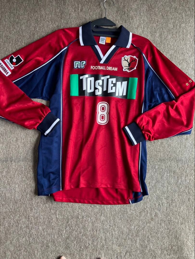 鹿島アントラーズ　ユニホームオレンジタグ　ベベットモデル