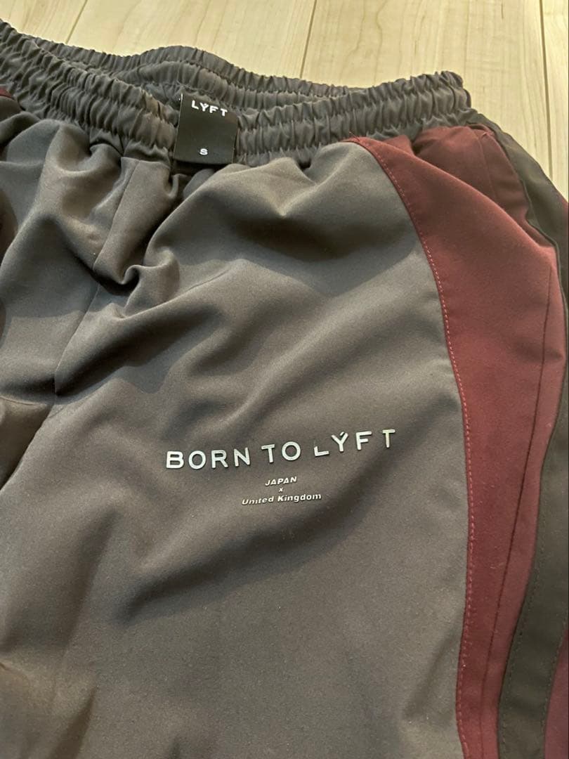 ウォーキング・ランニングウェア reaL.LYFT 2LINE WIDE TRACK pants