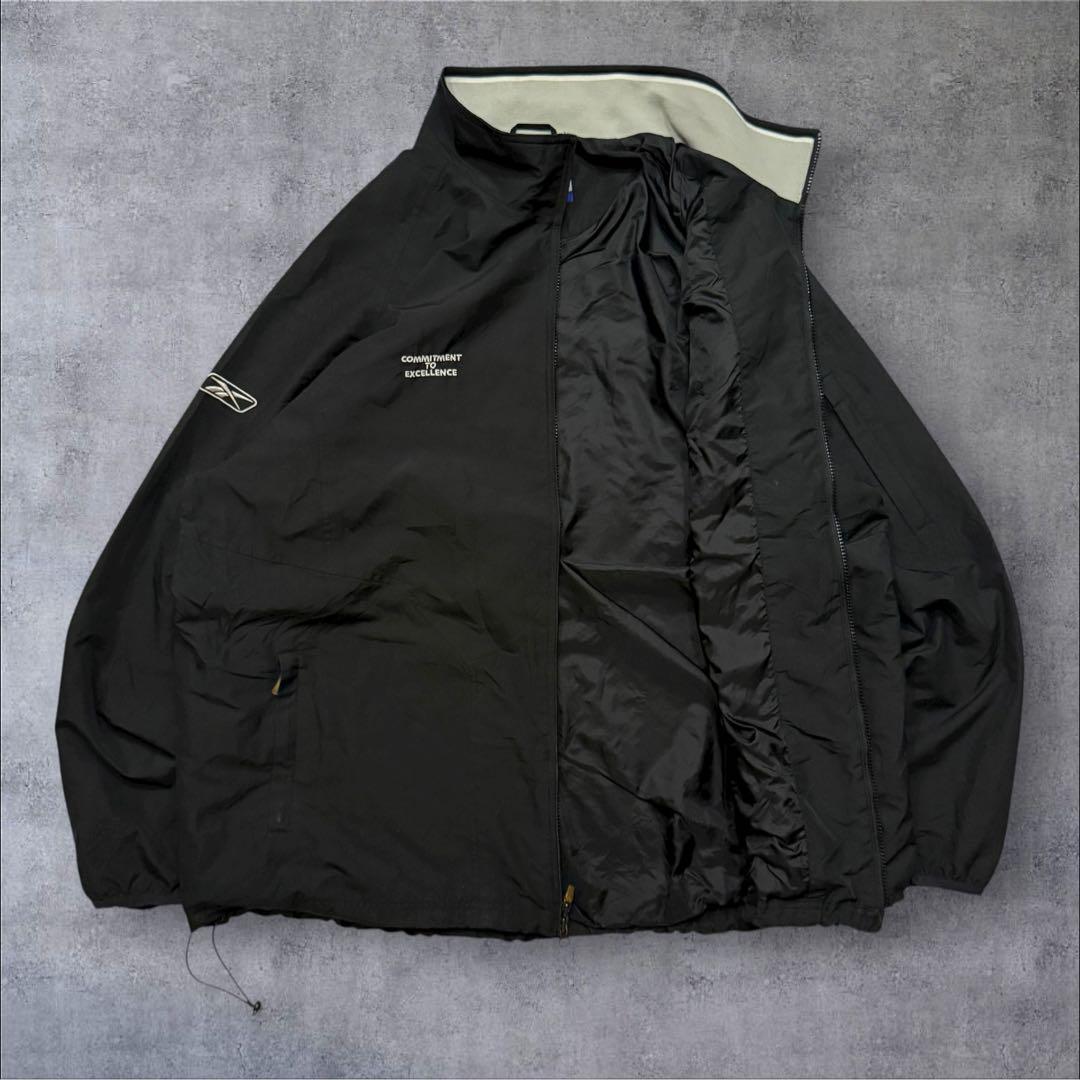 Reebokリーボック × RAIDERSレイダースNFLナイロンジャケット