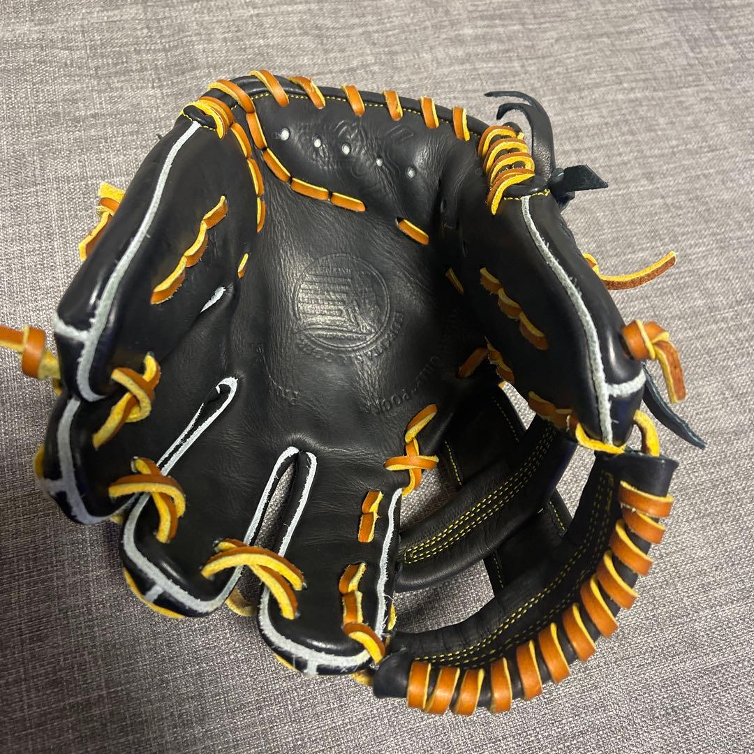 ず*な様 久保田スラッガー 軟式グローブ 黒/オレンジ　内野手用