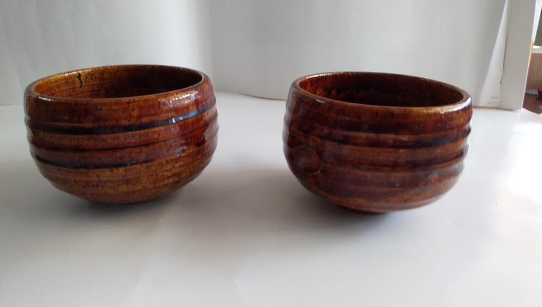 大樋焼 長楽造 大樋焼 飴釉 茶碗二客 共箱 栞 抹茶碗 茶道具 です。