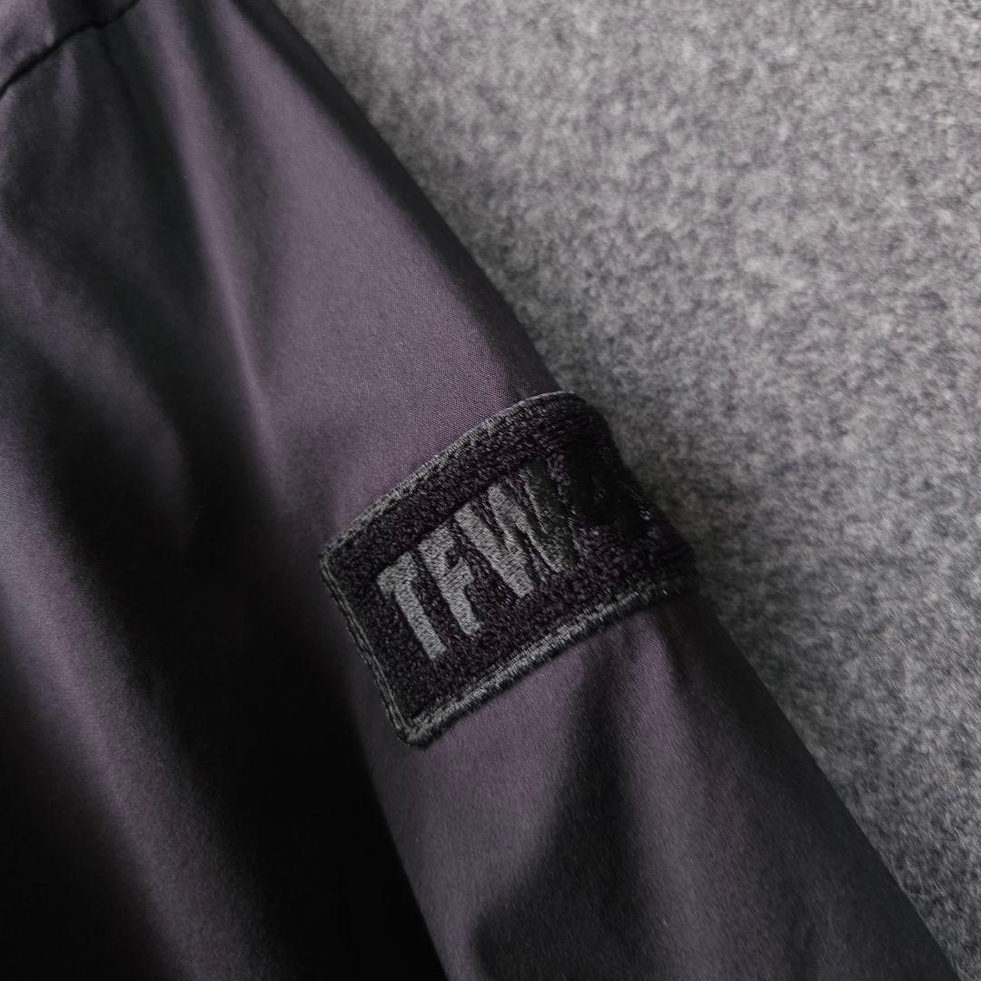 TFW49 背中ロゴネーム 長袖ゴルフブルゾンジャケット 黒 5 メンズ L