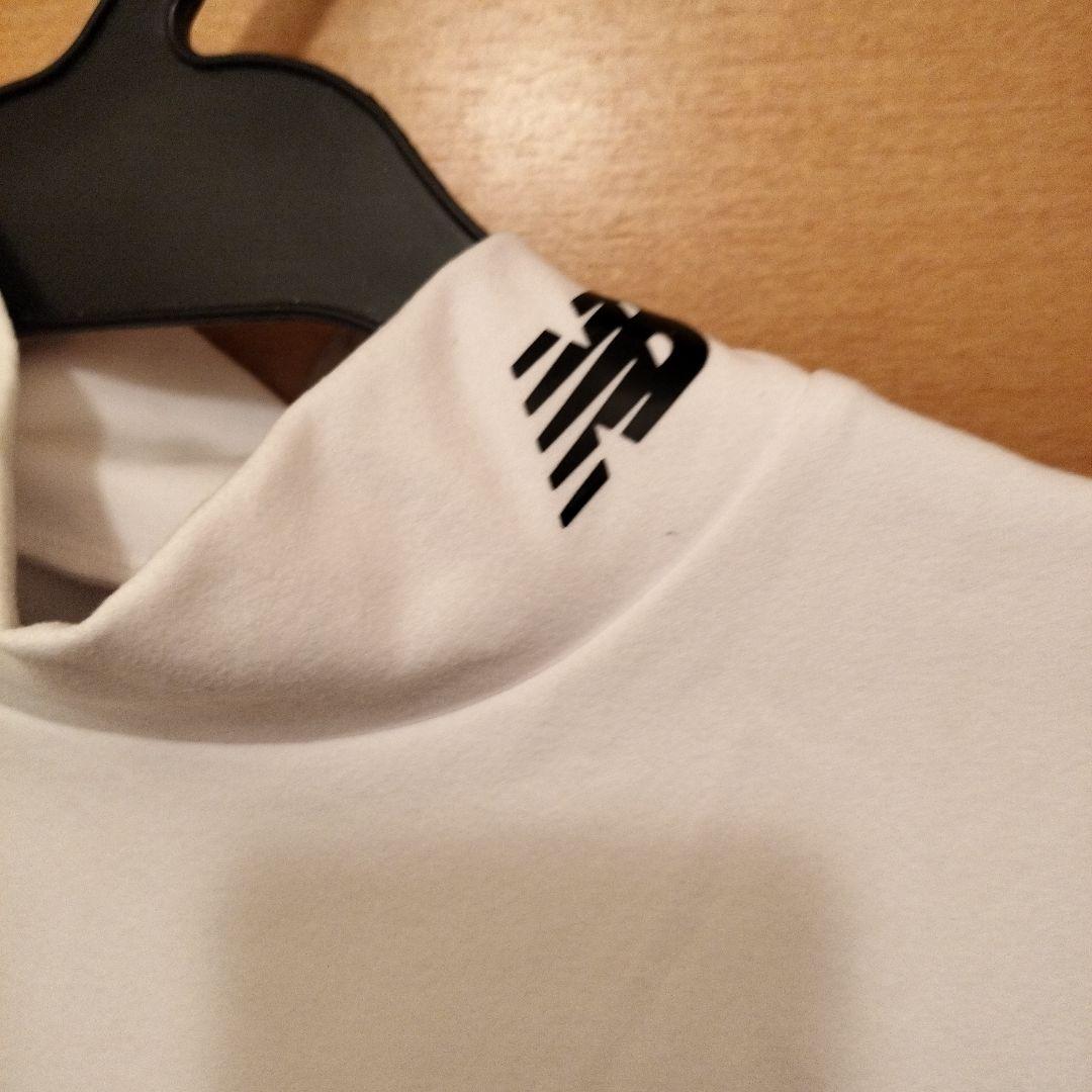 新品未使用2025年制new balance モックネックシャツ ホワイト即購入