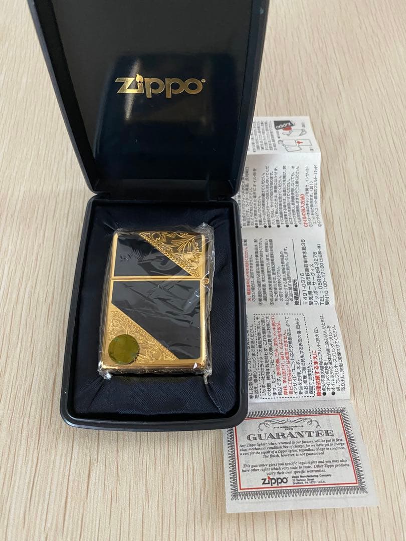 ZIPPO 2010年　ゴールド ブラック 彫刻デザイン 未使用 限定 ケース付