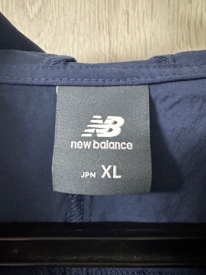 new balance タスランナイロンウーブンフーデッドジャケット XL