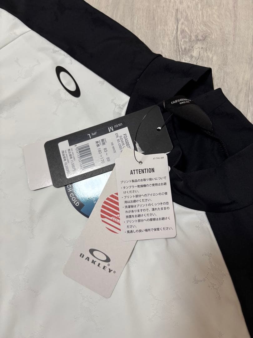新品　LサイズOAKLEY オークリーゴルフセットアップ モックネック＆スカート