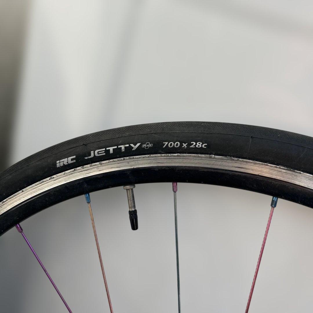 手組みホイールレインボースポーク前輪撤去品