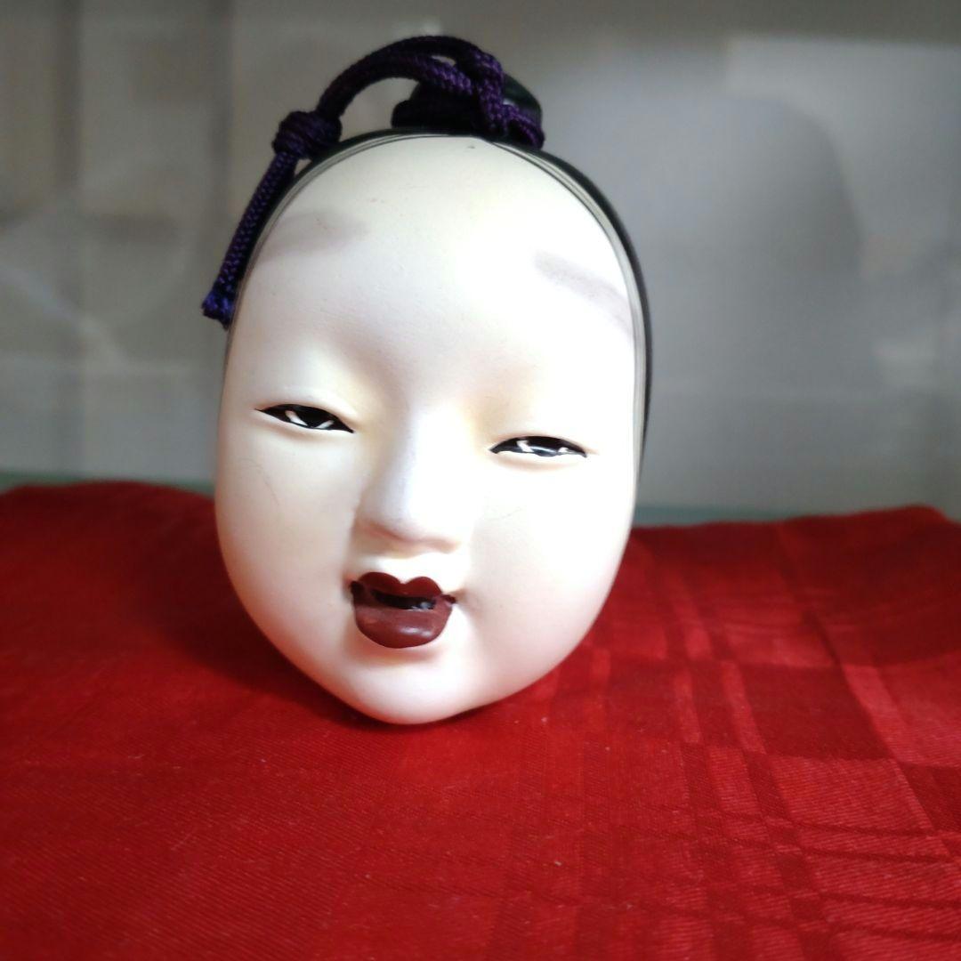 昭和の土鈴伝統的な女面と天狗の二面
