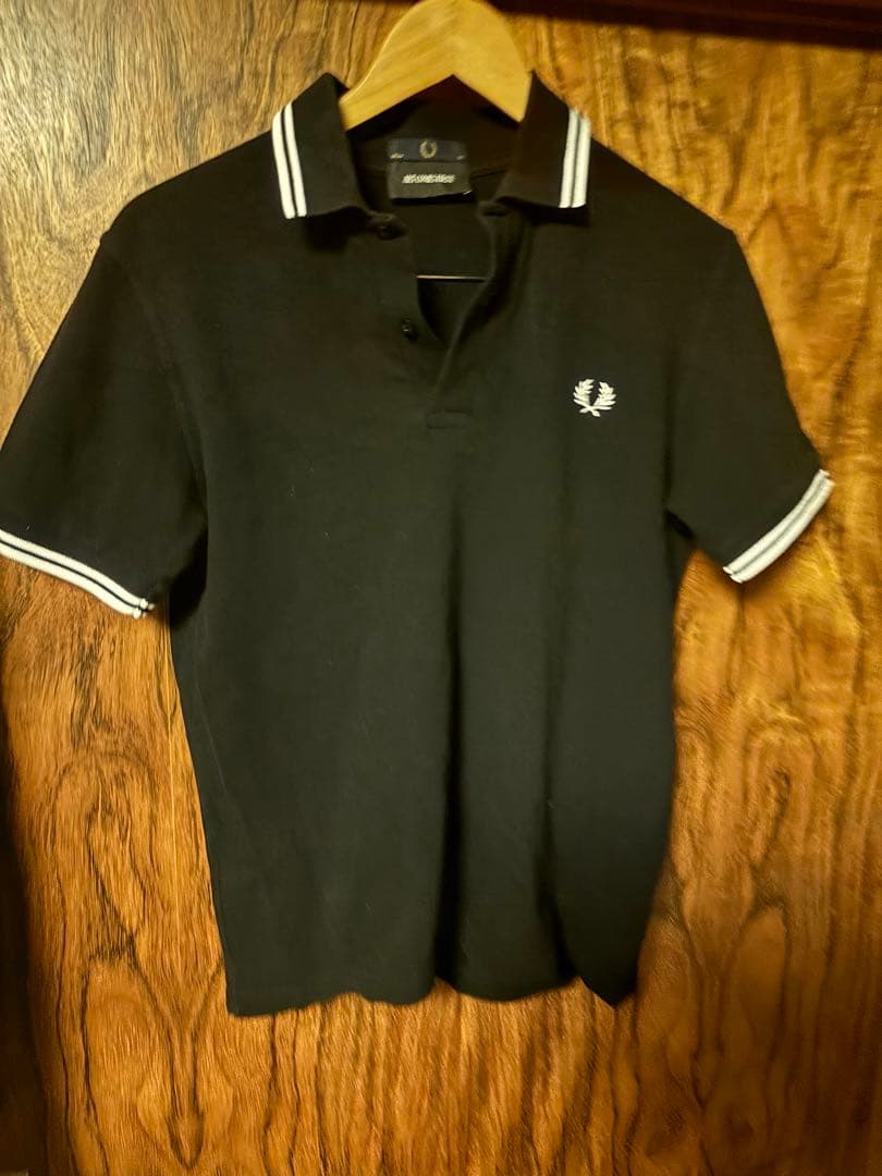 ART COMES FIRST ブラックポロシャツ