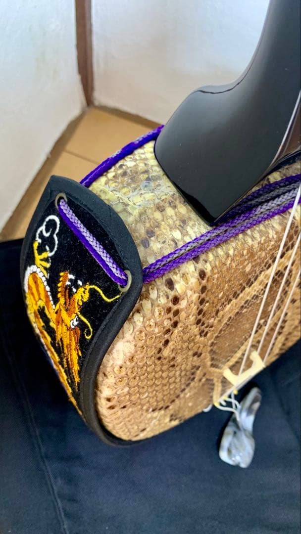 三線 沖縄 両面蛇皮 表側強化二重張り カラクイ1本弦2本新品交換