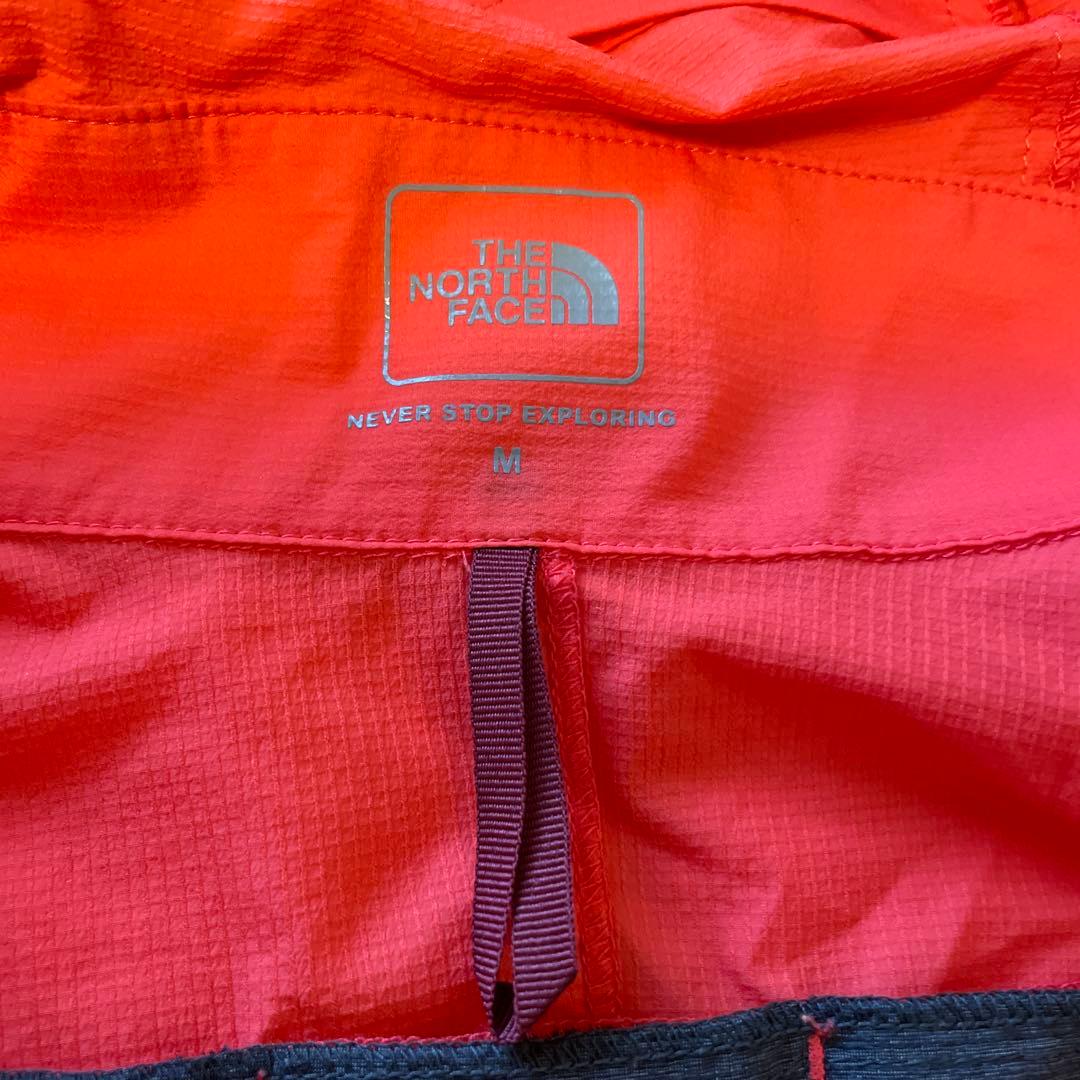 THE NORTH FACE フード付きウィンドブレーカー