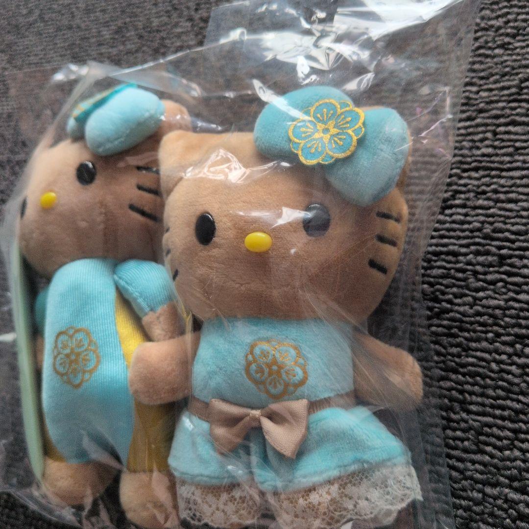 ハローキティ　日焼け　カハラホテル　ブルードレス　サーフボード　マスコット