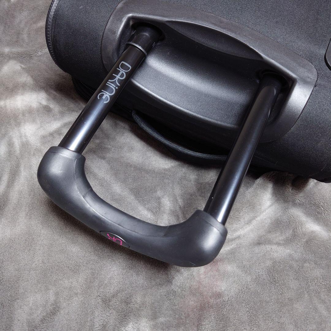 美品 DAKINE キャリーバッグ スーツケース 旅行バッグ ダカイン 黒ピンク