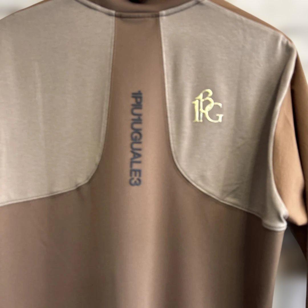 ウノピューウノウグァーレトレ　モックネックシャツ　サイズL