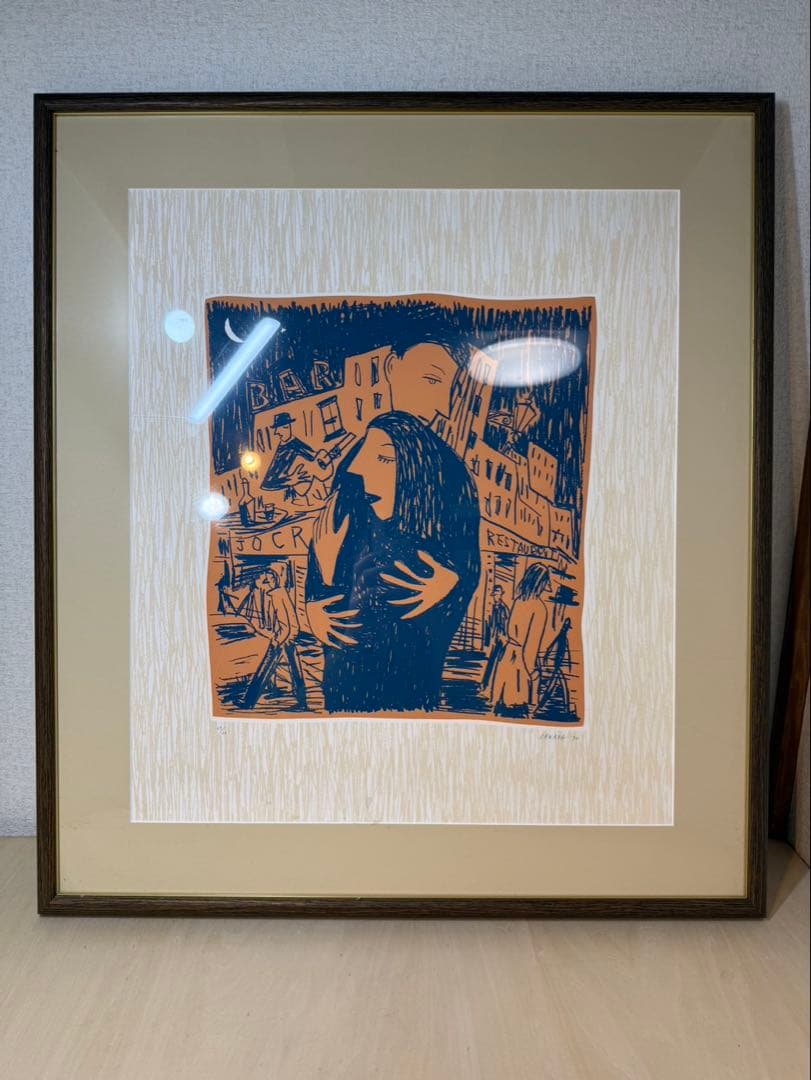 木版画 カップルと街の風景