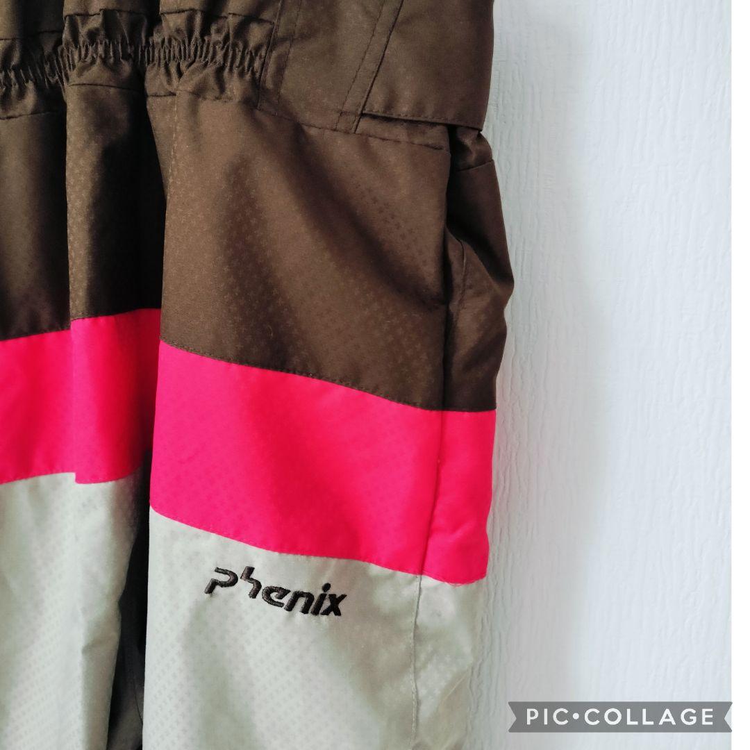 【美品】Phenix 女の子 スキーウェア 140 130調節 黒 花柄 上下