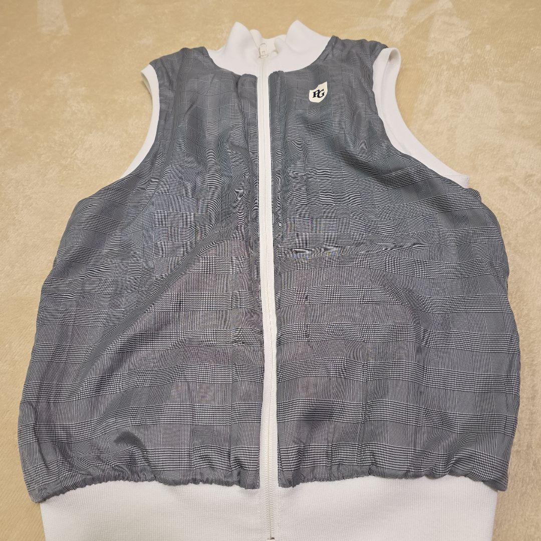 パーリーゲイツ　白☆グレンチェックリバーシブルベスト