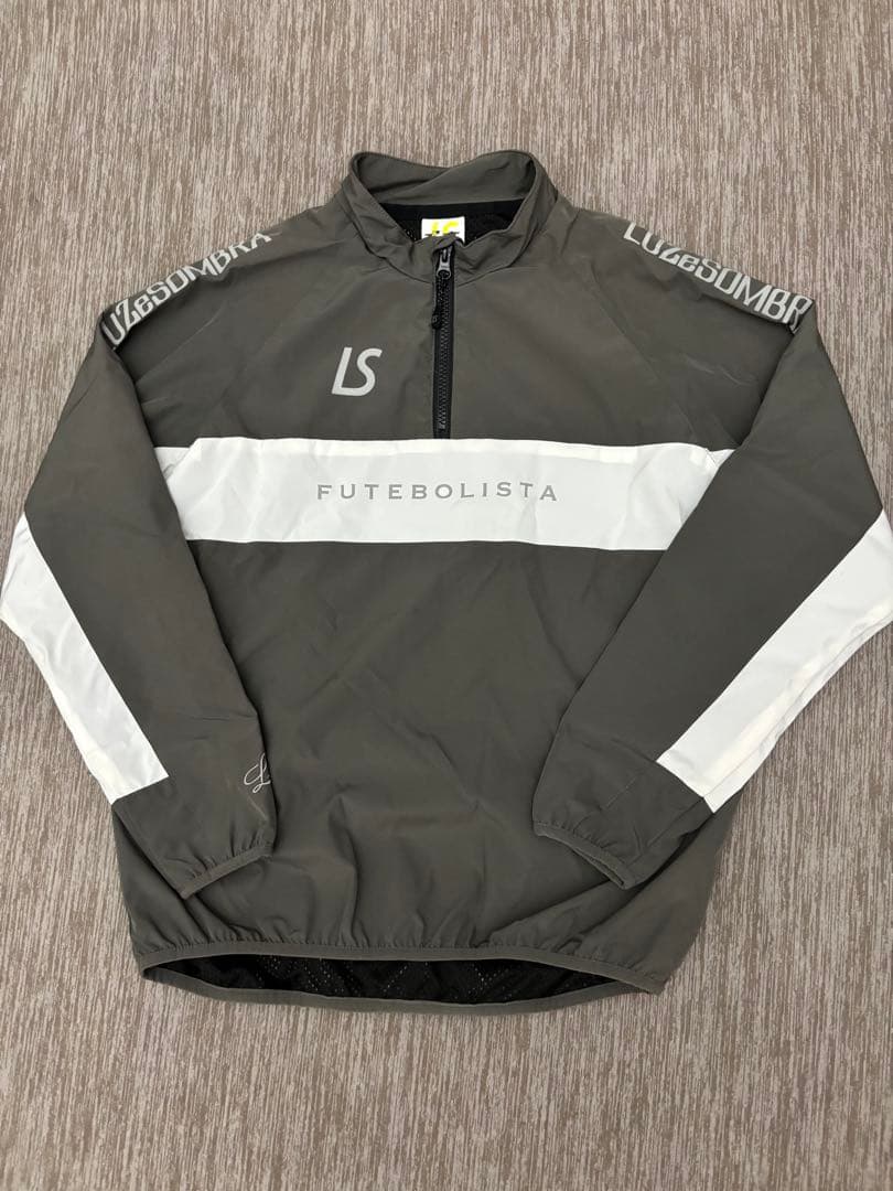 ルースイソンブラ ジュニア ストレッチタフタメッシュハーフジップトップ