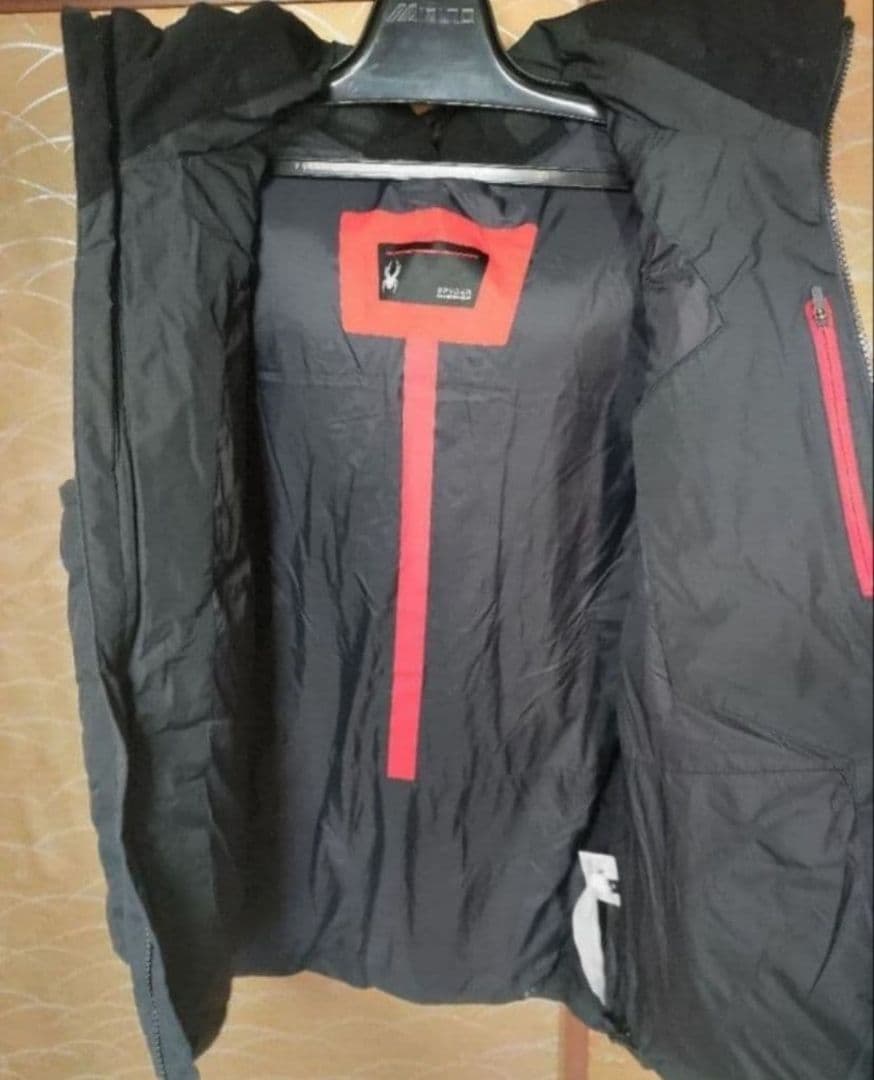 SPYDER U.S.SKI TEAM フード付きダウンベスト。