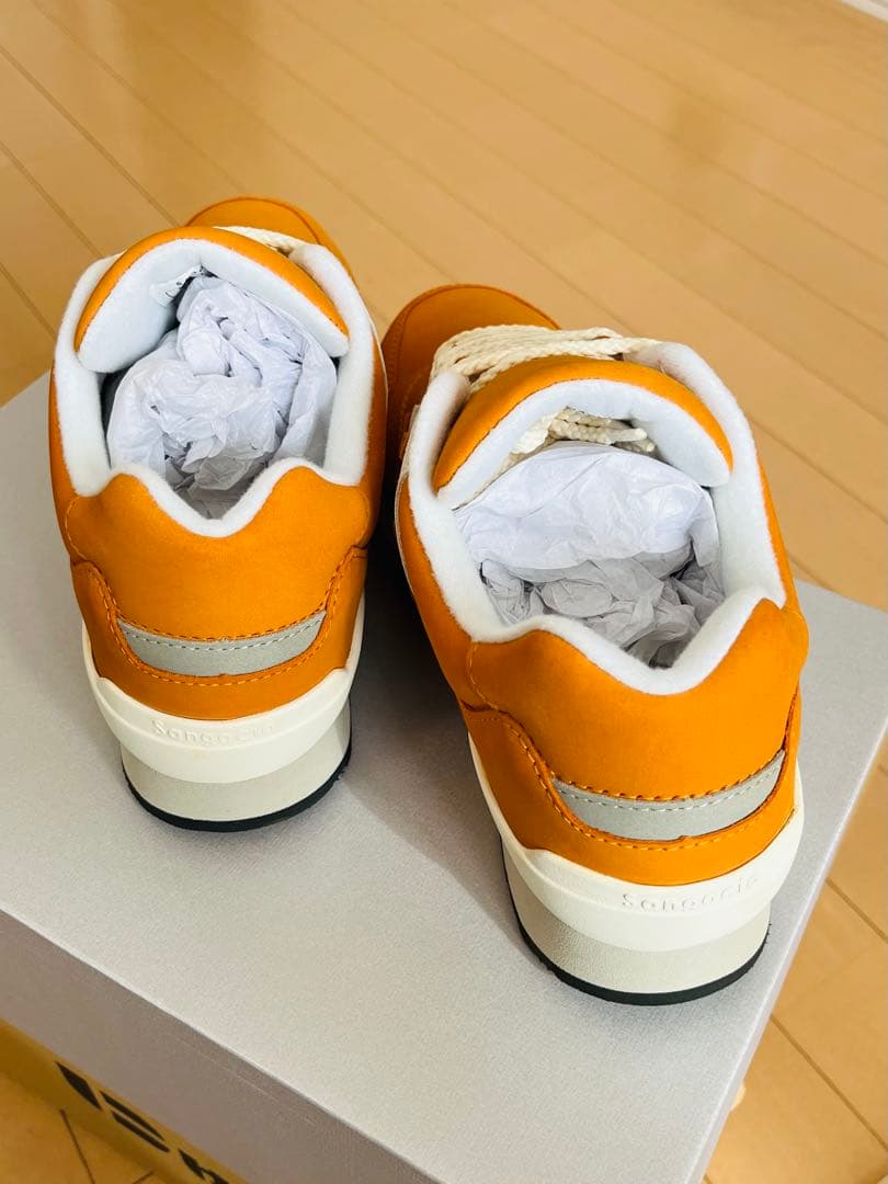 にゅ〜ず　オレンジ ランニングシューズ via SANGACIO 24.5cm