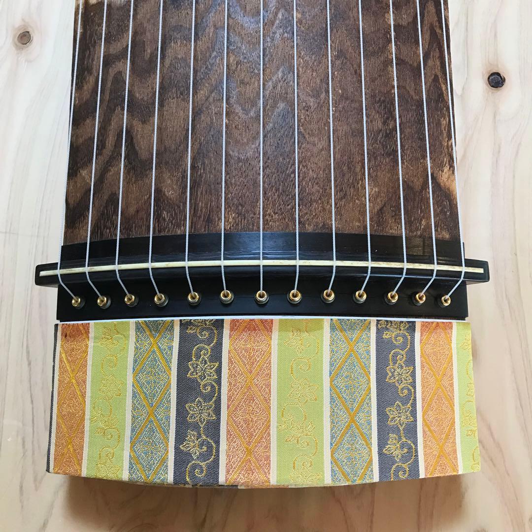 お琴　13弦　くり甲　綾杉彫　玉縁